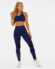 womens sustainable activewear in navy. Recycled plastic sports bra with squat proof leggings