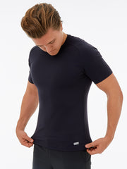 men's sustainable black gym top with a metal plaque with a wave logo. Black t-shirt made from recycled plastic